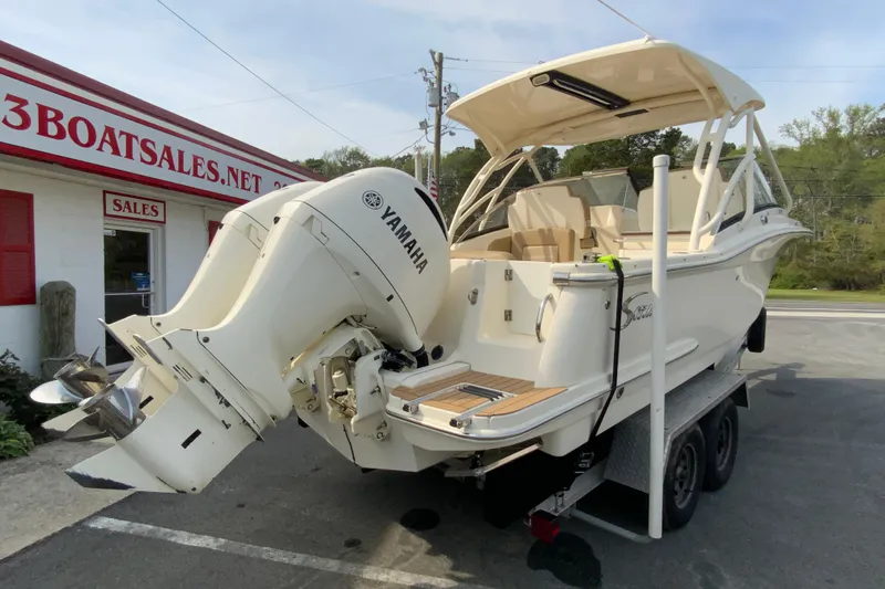 Slide: The Image of 2019 Scout 255 Dorado boat with Yamaha engine at dealership. - 10