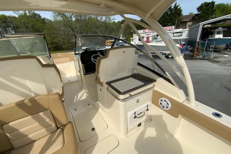 Slide: The Image of 2019 Scout 255 Dorado boat interior with seating and helm station. - 15