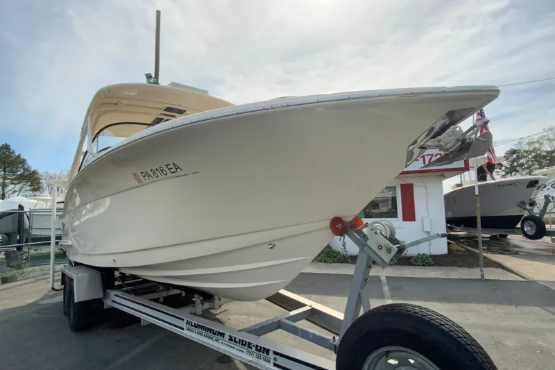 Slide: The Image of 2019 Scout 255 Dorado boat on trailer in outdoor setting. - 3