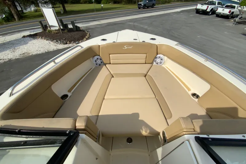 Slide: The Image of 2019 Scout 255 Dorado boat interior with tan seating and speakers. - 31