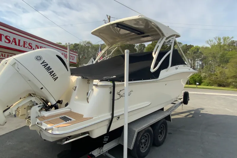 Slide: The Image of 2019 Scout 255 Dorado boat with Yamaha engine on trailer. - 34