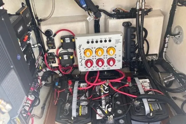 Slide: The Image of Electrical system of a 2017 Yellowfin 26 Hybrid boat with batteries and wiring. - 14