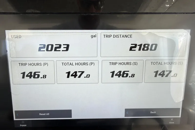 Slide: The Image of Display screen showing fuel usage and trip data for a 2021 Tiara Sport 34 LS. - 31