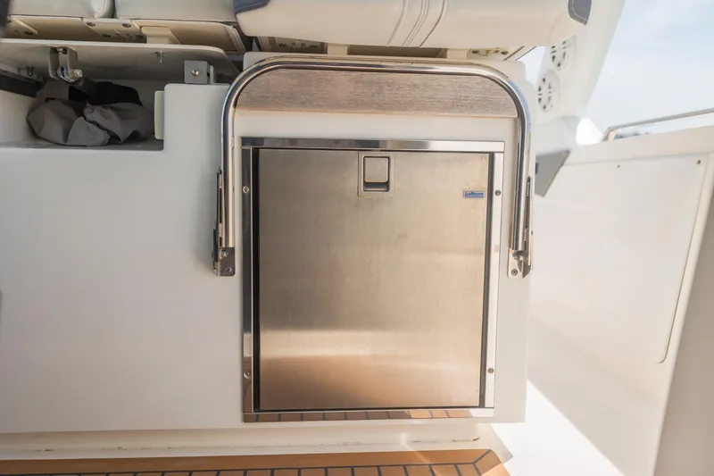 Slide: The Image of Stainless steel storage compartment on 2021 Tiara Sport 34 LS boat. - 33