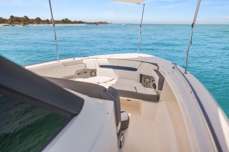 Slide: The Image of 2021 Tiara Sport 34 LS boat interior with ocean view and seating area. - 39