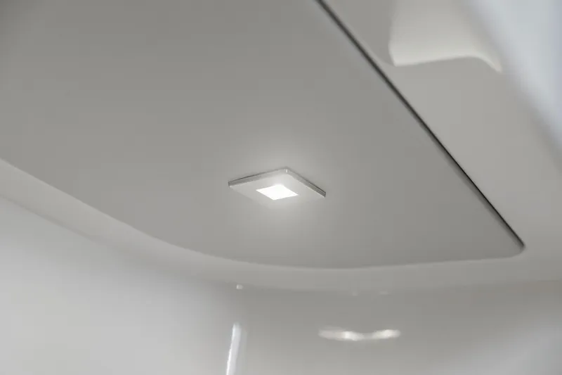 Slide: The Image of Ceiling light fixture inside 2021 Tiara Sport 34 LS boat cabin. - 53