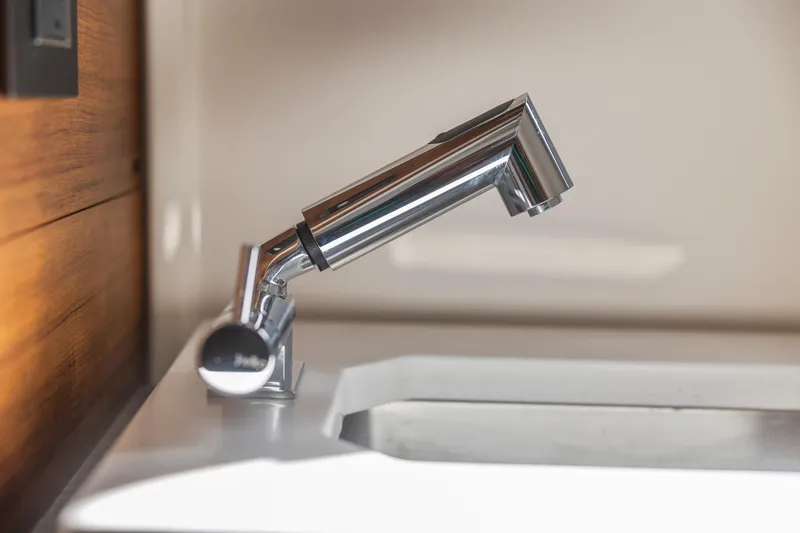 Slide: The Image of Chrome faucet in the 2021 Tiara Sport 34 LS boat interior. - 57