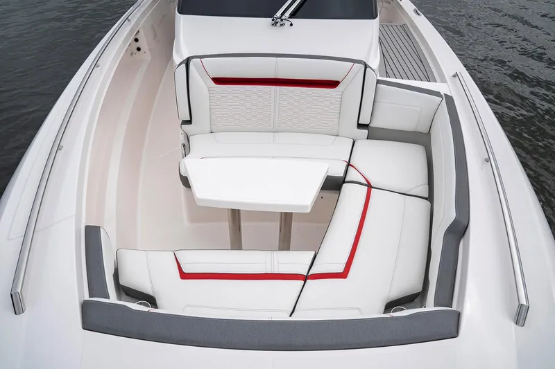 Slide: The Image of Manufacturer Provided Image: 2021 Tiara Sport 34 LS boat with white and red cushioned seating area. - 6