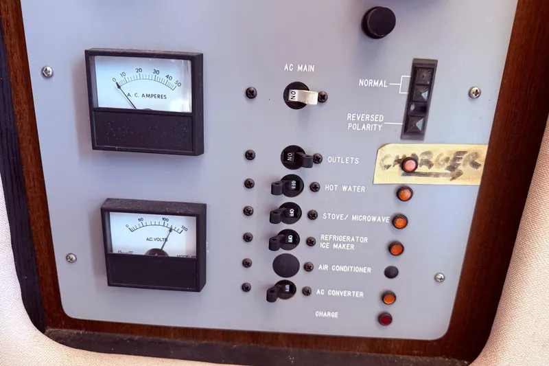 Slide: The Image of Electrical control panel on a 1987 Sea Ray 340 Sedan Bridge boat. - 31