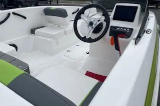 Slide: The Image of 2024 Tahoe T16 boat interior with steering wheel and seating, featuring modern design elements. - 3