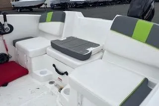 Slide: The Image of 2024 Tahoe T16 boat interior with white and green seating, featuring modern design and comfort. - 6