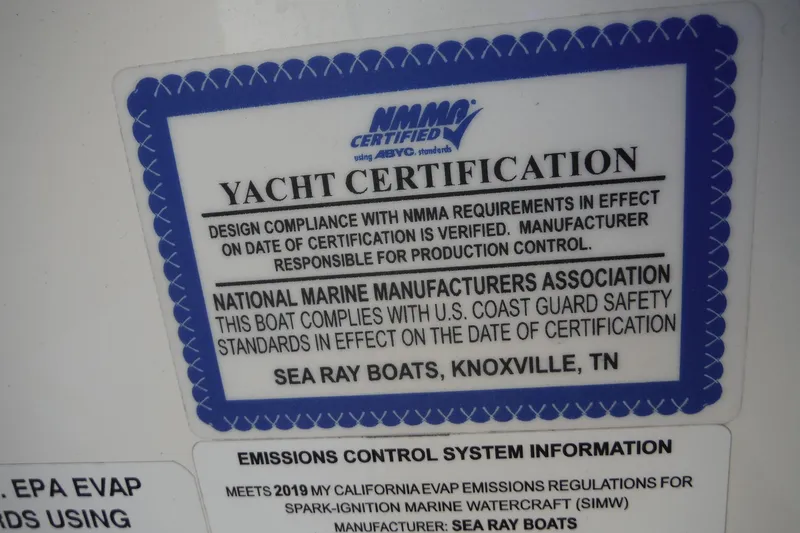 Slide: The Image of Yacht certification label for 2019 Sea Ray SDX 290 Outboard, NMMA and U.S. Coast Guard compliant. - 26