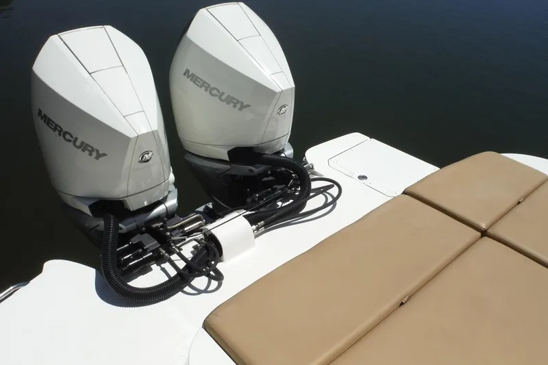 Slide: The Image of 2019 Sea Ray SDX 290 Outboard with dual Mercury engines on water. - 28