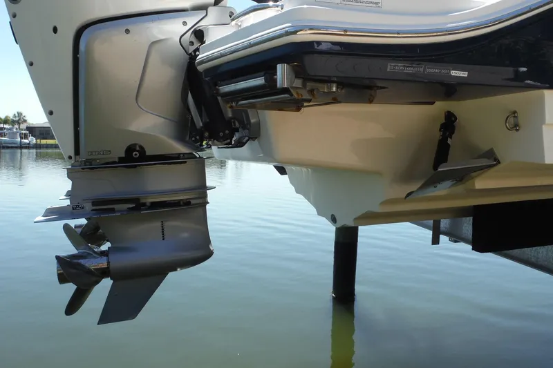 Slide: The Image of 2019 Sea Ray SDX 290 Outboard motor and propeller above water. - 30