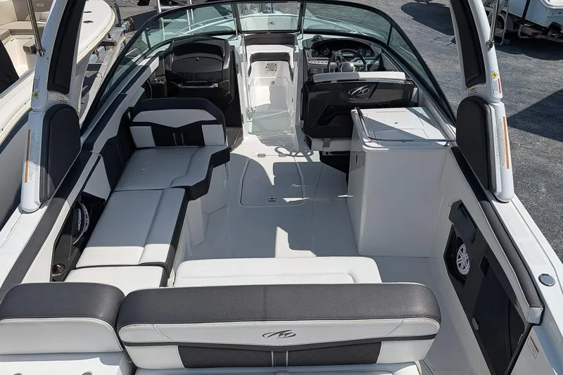 Slide: The Image of 2021 Monterey 255SS Super Sport boat interior with sleek seating and modern dashboard. - 10