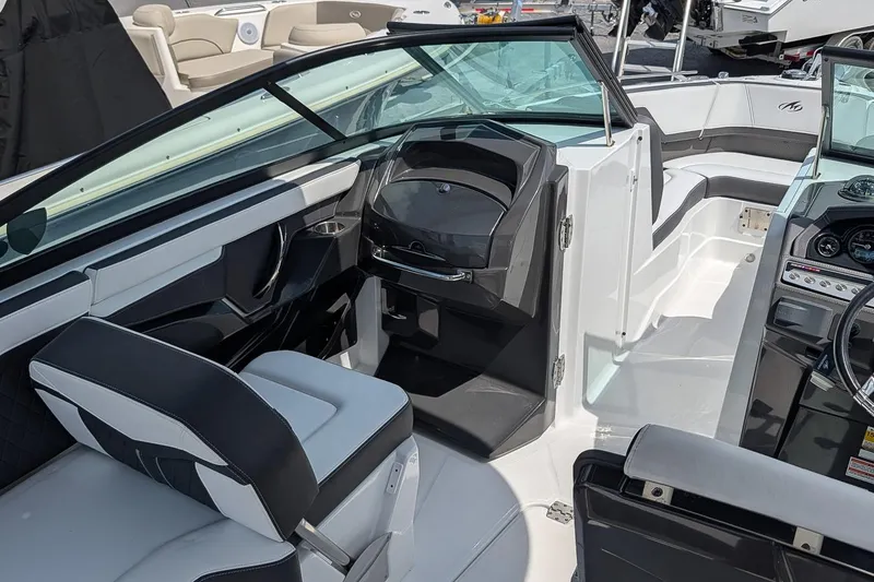 Slide: The Image of 2021 Monterey 255SS Super Sport boat interior with sleek seating and modern dashboard. - 19