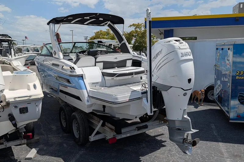 Slide: The Image of 2021 Monterey 255SS Super Sport boat with Mercury 350 engine on trailer. - 2