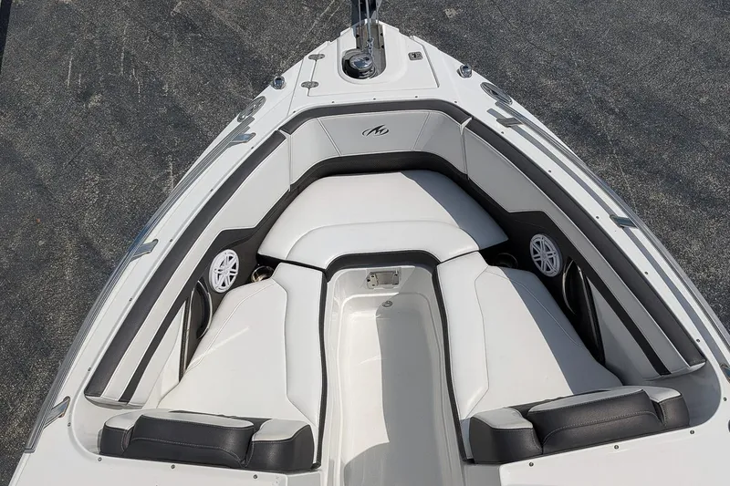 Slide: The Image of 2021 Monterey 255SS Super Sport boat interior with white seating and speakers. - 21