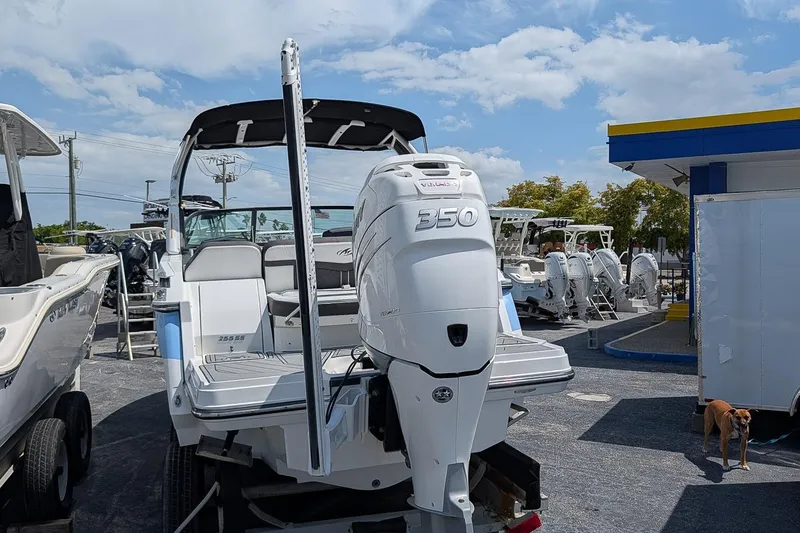 Slide: The Image of 2021 Monterey 255SS Super Sport boat with powerful 350 engine at a dealership. - 4