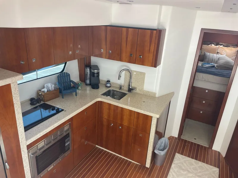Slide: The Image of Luxurious kitchen interior of 2012 Cruisers Yachts 48 Cantius with modern amenities. - 10