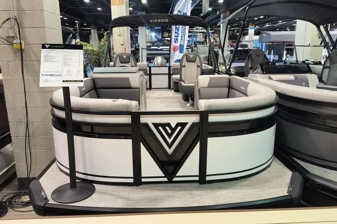 The Image of 2026 Viaggio V22U pontoon boat displayed at an indoor exhibition. - 0