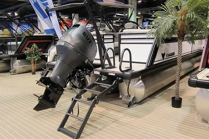 Slide: The Image of 2026 Viaggio V22U pontoon boat with Suzuki outboard motor displayed indoors. - 10