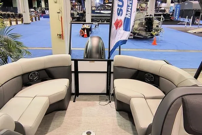 Slide: The Image of 2026 Viaggio V22U boat interior with plush seating at a marine exhibition. - 3