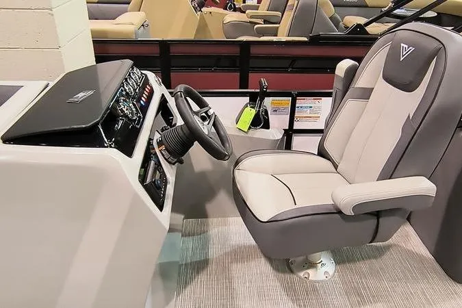 Slide: The Image of Captain's chair and control panel of 2026 Viaggio V22U boat, featuring modern design and technology. - 6