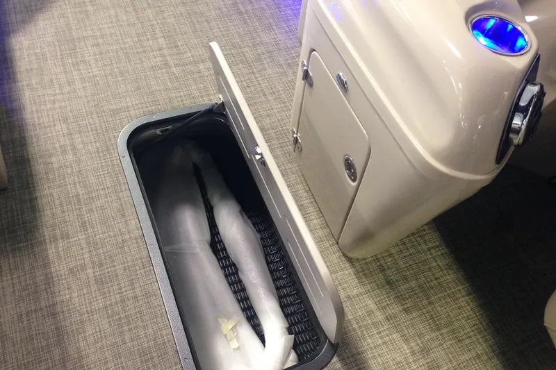 Slide: The Image of Open storage compartment on 2016 Misty Harbor 2285 Biscayne Bay RL boat. - 19