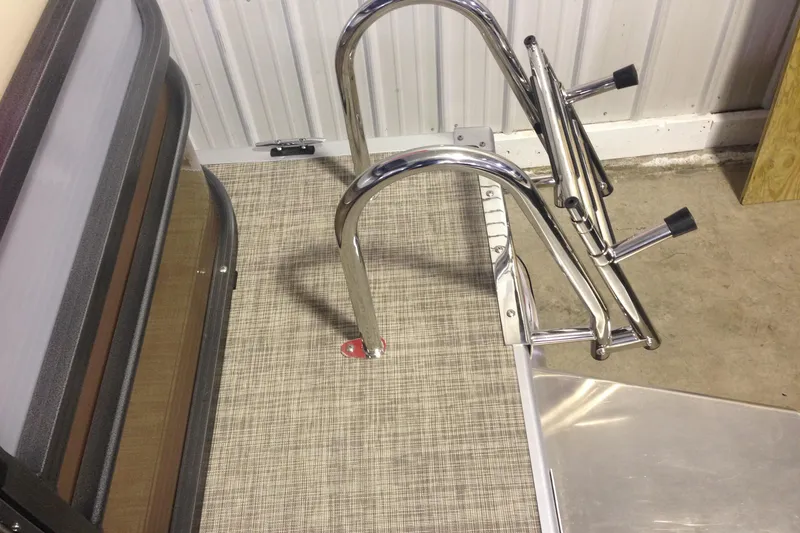 Slide: The Image of 2016 Misty Harbor 2285 Biscayne Bay RL boat ladder and deck detail. - 20