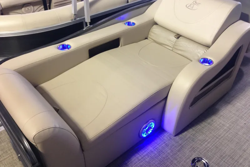 Slide: The Image of Luxurious seating on 2016 Misty Harbor 2285 Biscayne Bay RL pontoon boat with blue LED cup holders. - 21