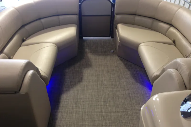 Slide: The Image of Luxurious seating inside 2016 Misty Harbor 2285 Biscayne Bay RL pontoon boat with ambient lighting. - 23