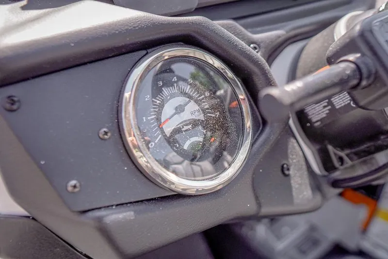 Slide: The Image of Close-up of 2026 Skeeter ZXR20 SE RPM gauge on dashboard. - 12