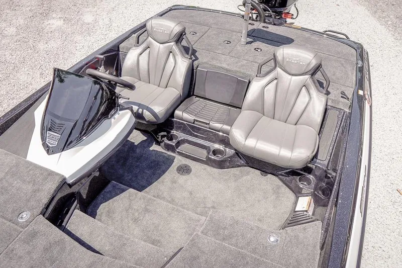 Slide: The Image of 2026 Skeeter ZXR20 SE boat interior with dual seats and steering console. - 20