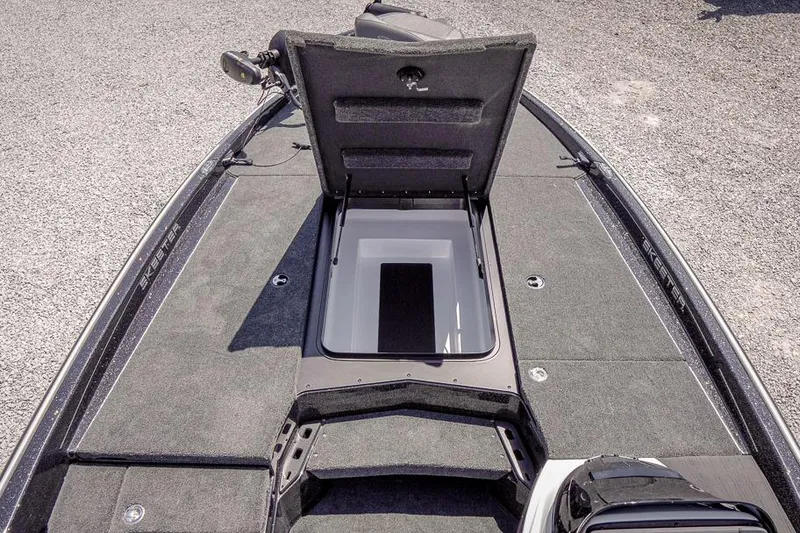 Slide: The Image of 2026 Skeeter ZXR20 SE boat deck with open storage compartment. - 25