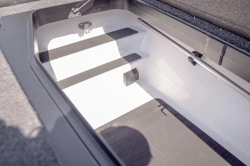 Slide: The Image of 2026 Skeeter ZXR20 SE boat storage compartment with sleek interior design. - 28
