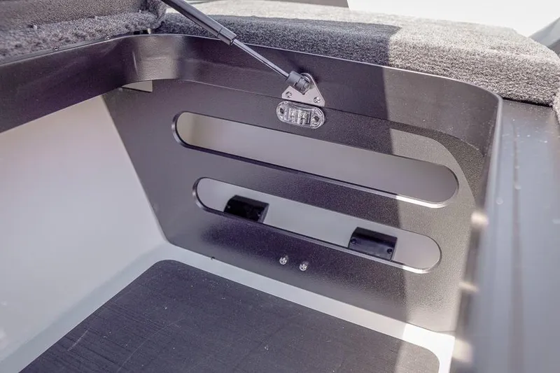 Slide: The Image of Interior compartment of 2026 Skeeter ZXR20 SE boat, featuring sleek design and storage space. - 31