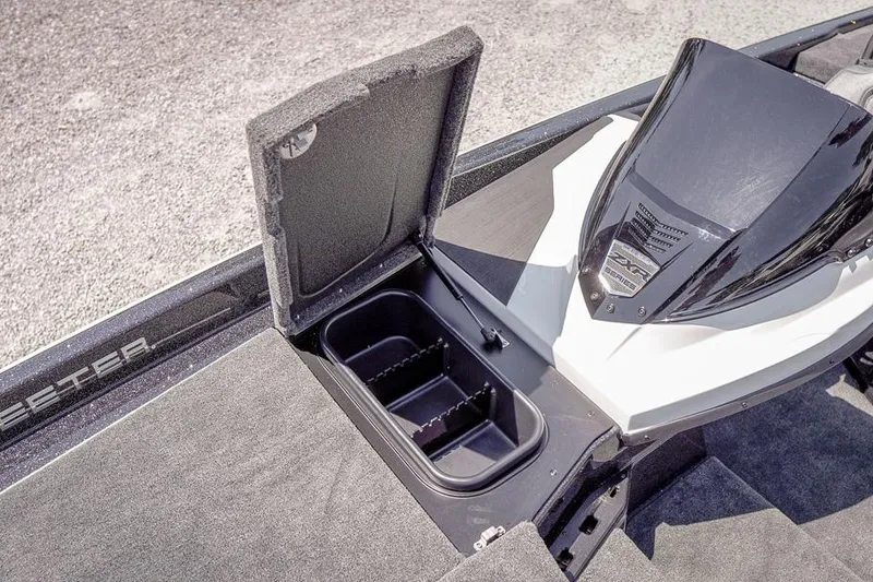 Slide: The Image of 2026 Skeeter ZXR20 SE boat storage compartment with open lid, showcasing interior space. - 32
