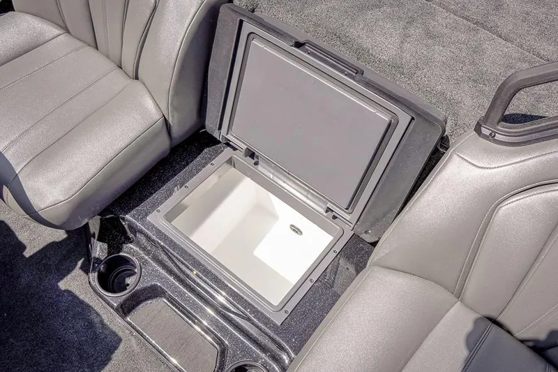 Slide: The Image of Interior of 2026 Skeeter ZXR20 SE boat with open storage compartment. - 35