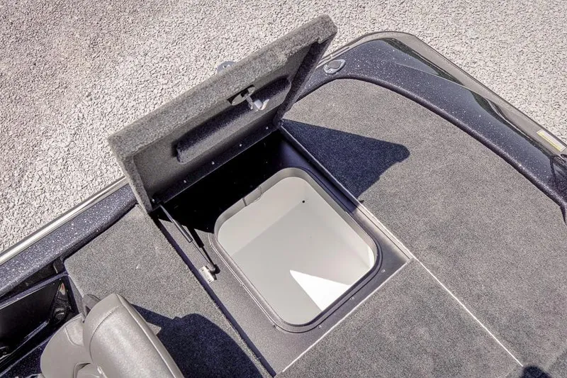 Slide: The Image of Open storage compartment on 2026 Skeeter ZXR20 SE boat deck. - 39