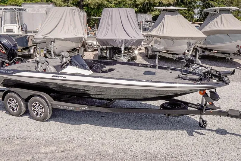 Slide: The Image of 2026 Skeeter ZXR20 SE boat on trailer in a storage lot. - 4