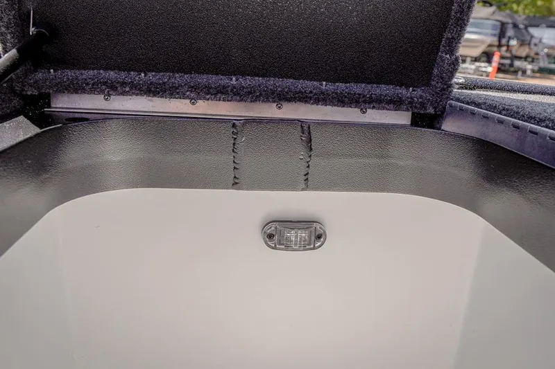 Slide: The Image of Interior view of 2026 Skeeter ZXR20 SE boat compartment with light fixture. - 40