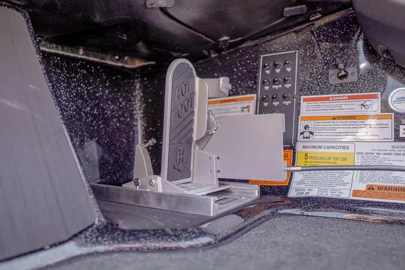 Slide: The Image of Interior view of 2026 Skeeter ZXR20 SE boat with foot pedal and control panel. - 44