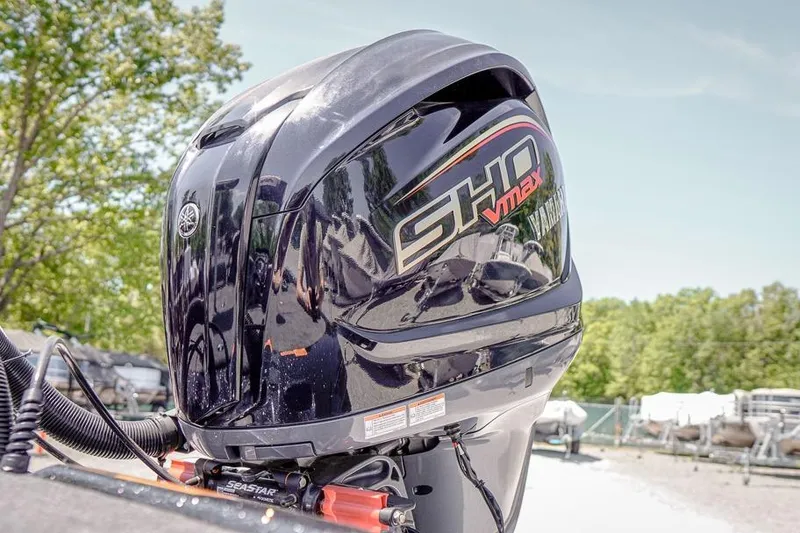 Slide: The Image of 2026 Skeeter ZXR20 SE with Yamaha SHO VMAX outboard motor in a sunny outdoor setting. - 55
