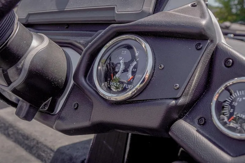 Slide: The Image of Close-up of 2026 Skeeter ZXR20 SE dashboard gauges, showing volt and fuel indicators. - 9