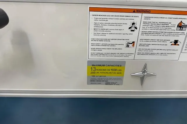 Slide: The Image of 2025 Berkshire 24UL LE B capacity and warning labels, 13-person limit, 150 HP motor. - 12