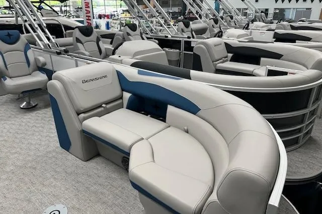 Slide: The Image of 2025 Berkshire 24UL LE B pontoon boat with luxurious seating and modern design. - 14
