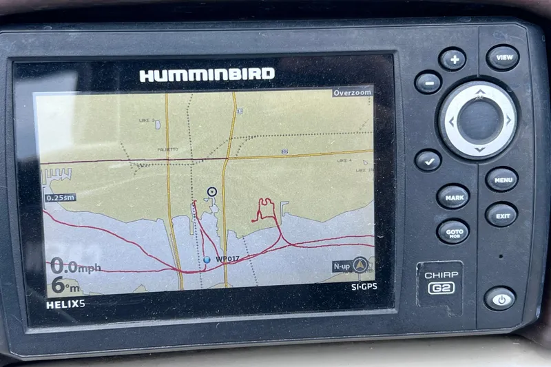 Slide: The Image of Humminbird GPS display on 2018 Berkshire 25 STS Tri Toon boat, showing navigation map. - 34
