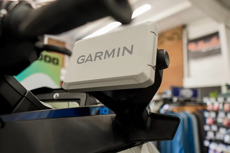 Slide: The Image of 2026 Sea-Doo FishPro Sport 170 with Garmin GPS system in a showroom. - 12