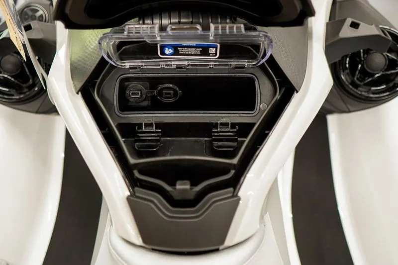 Slide: The Image of 2026 Sea-Doo FishPro Sport 170 dashboard with USB ports and storage compartment. - 16